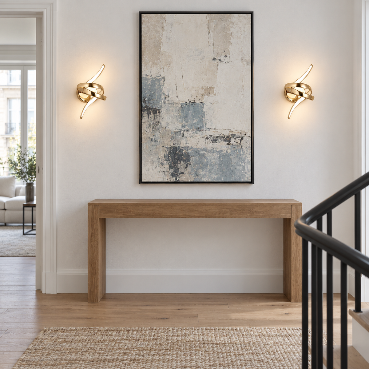 Appliques murales nœud LED doré dans une entrée contemporaine